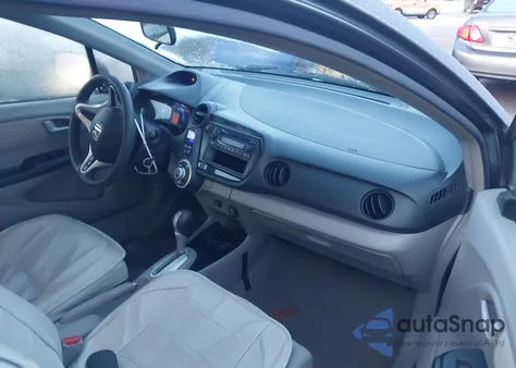 2014 Honda Insight from USA, damaged, VIN JHMZE2H33ES000300